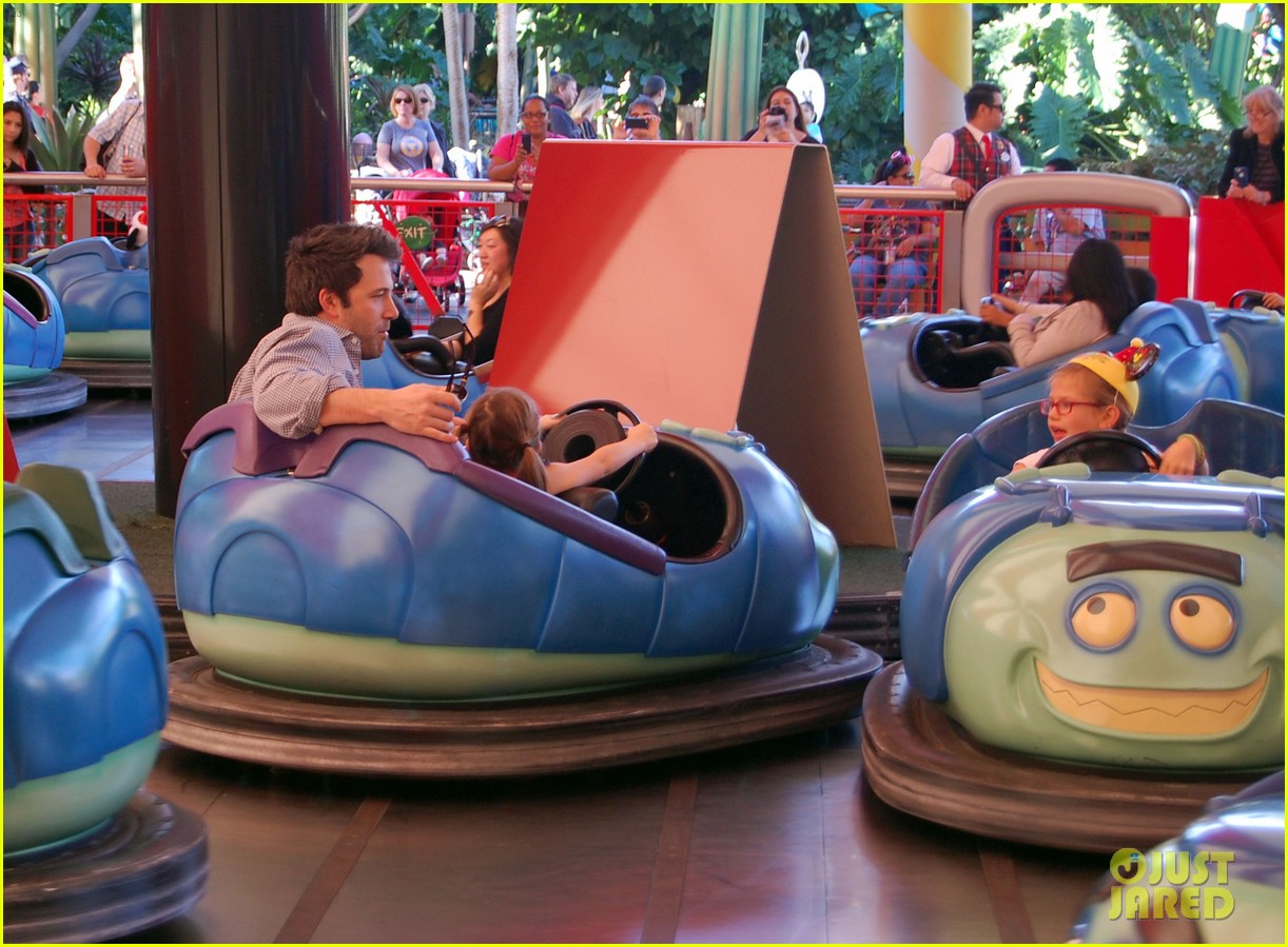 Full Sized Photo of ben affleck rides bumper cars at disneyland with