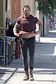 shia labeouf lifts his shirt bares torso 05