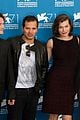 milla jovovich cradles baby bump at premiere 12