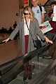kate upton arrives at airport 04