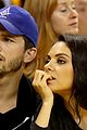 mila kunis ashton kutcher share courtside kiss at nba finals 03