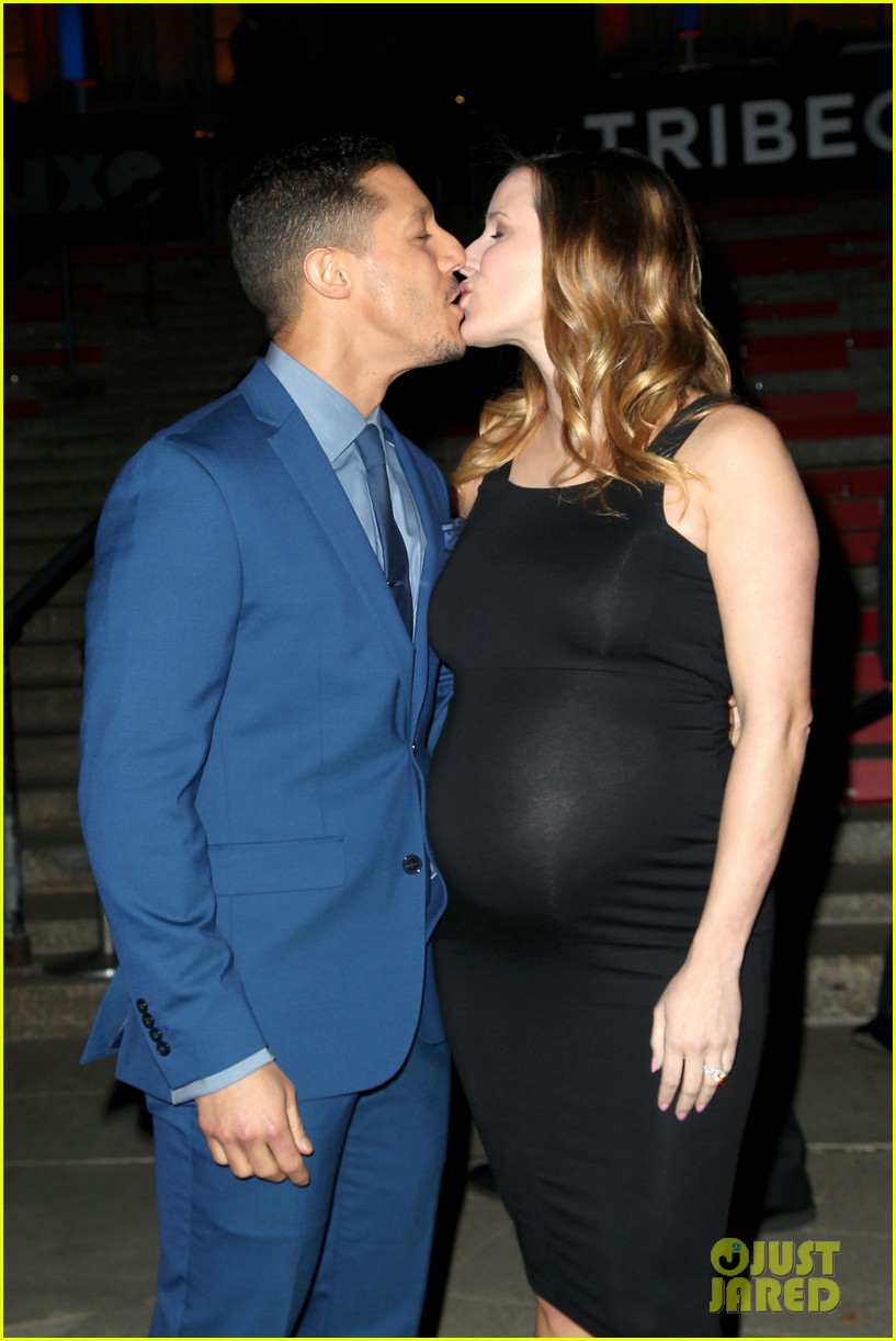 Husband and wife: Theo Rossi and Meghan kissing: pregnant Meghan flaunted her baby bumps